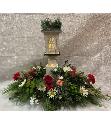 Christmas Memories Centerpiece. An arrangement by Flowers by Neil.