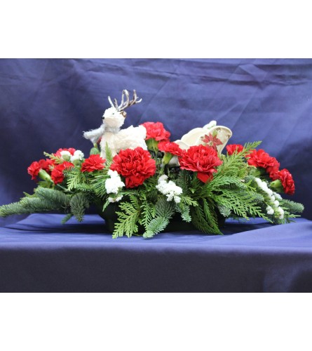 Waiting on Santa. An arrangement by Stephenville Floral.