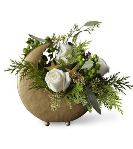 FTD Stardust - Deluxe. An arrangement by Jennings Florists.