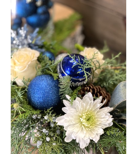 Blue Hues Holiday Centerpiece. An arrangement by Donato's Floral.