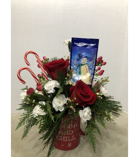 Snow Mug and Cocoa. An arrangement by Renton Flower Shop.
