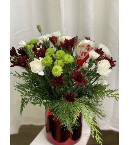 Merry Christmas Vase with Chocolate Pop. An arrangement by Anderson Flowers.