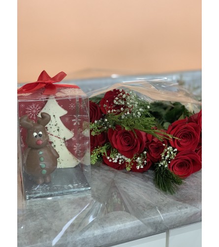 Holiday red roses with Chocolate Reindeer Buddy. An arrangement by Lori's Hearts and Flowers.