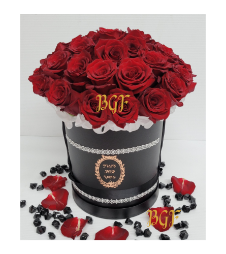 Red Roses in a Black Couture Box