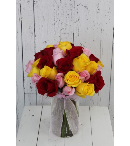 36 Mystery Color Rose Stems Special. An arrangement by Incredible Florist Seton.