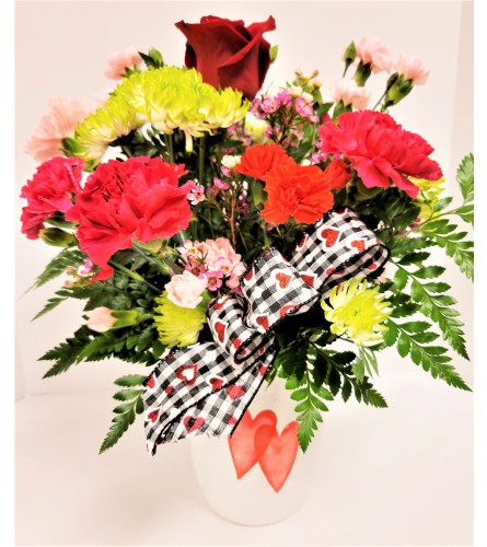 Cupid - Valentine. An arrangement by Brown Floral and Fudge.