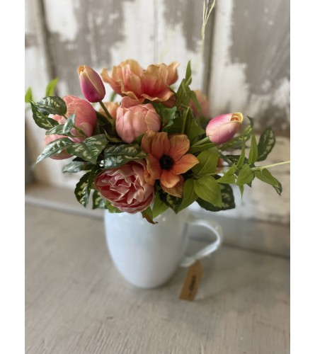 Picked Flowers in a Pitcher (Silk). An arrangement by Metcalfe Florist and Pleasant View Greenhouses.