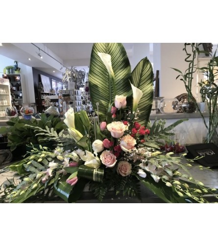 Casket Spray #18. An arrangement by Seasons Change Designs.