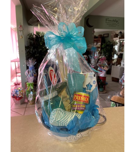 Creative Colander Gift Basket. An arrangement by Flowers by Anna.