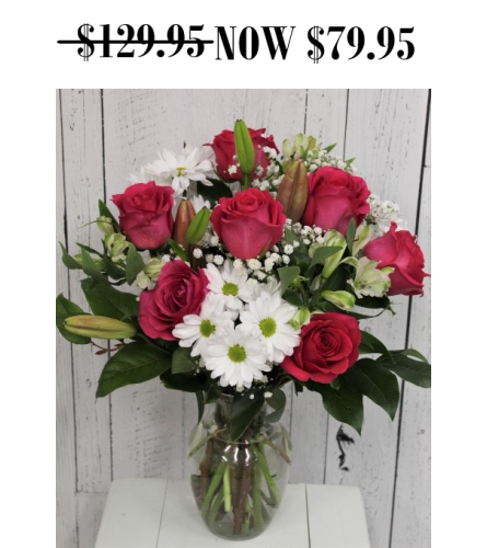 Premium Arriving in Style with Pink Floyd. An arrangement by Avenida Flowers.