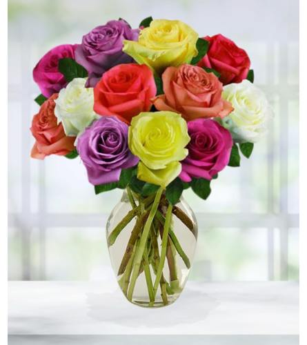 12 Assorted Roses (Colour May Vary) - Deluxe. An arrangement by Floratechnics.