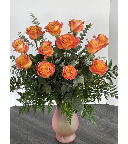 Free Spirit Dozen Roses - Standard. An arrangement by Violeta's Flower Shop.