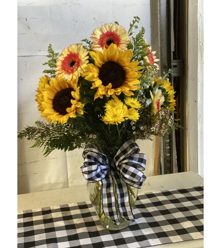Shades of Sunshine. An arrangement by Kelly Ann's Floral.