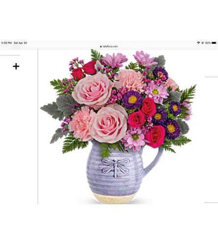 Playful pitcher bouquet for Mom - Deluxe. An arrangement by Kitchener Ontario Florist.