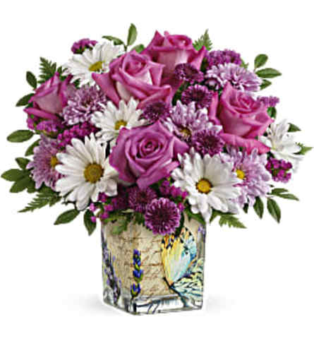 Teleflora's Pretty Butterfly Bouquet - Deluxe. An arrangement by Sponseller's Flower Shop Inc.