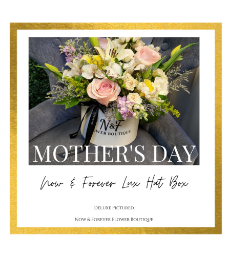 Mother's Day Garden Style Top-Up Hat Box. An arrangement by Now and Forever Flower Boutique.