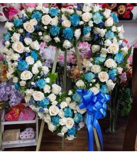 BLUE HEART II. An arrangement by Butterflies Flower Shop.