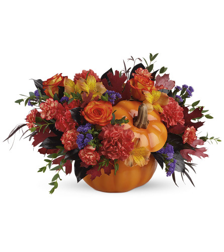 Hauntingly Pretty Pumpkin (Teleflora) - Deluxe. An arrangement by North Liberty Flower Shop.