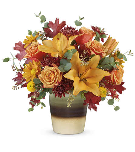 Rustic Sunrise Bouquet (Teleflora) - Deluxe. An arrangement by North Liberty Flower Shop.