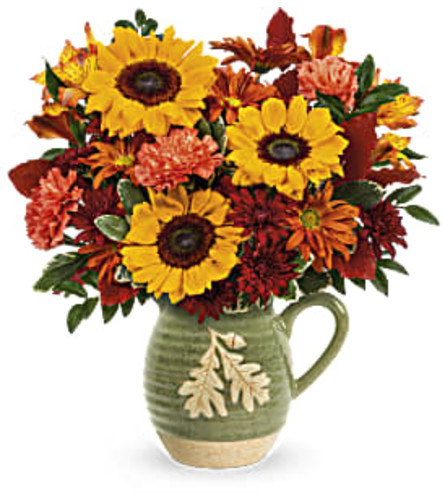 Teleflora's Autumn Acorn Bouquet - Deluxe. An arrangement by Jennings Florists.
