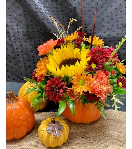 Fall/Thanksgiving Pumpkin Keepsake Arrangement. An arrangement by Forest Florist.