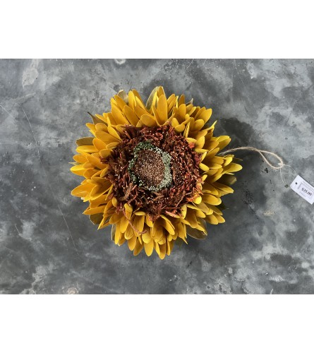 Large Wooden Sunflower. An arrangement by Metcalfe Florist and Pleasant View Greenhouses.
