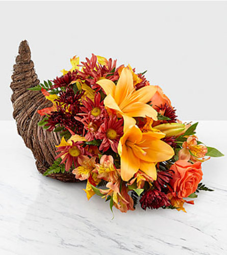 Harvest Comfort Cornucopia FTD - Standard. An arrangement by Balloon Bouquets Plus.