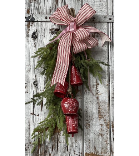 Scandinavian Swag with Red Bells. An arrangement by Metcalfe Florist and Pleasant View Greenhouses.