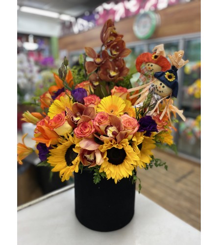 Autumn Vibes and Cheers. An arrangement by Flower World and Gifts.