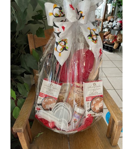 Baking Gift in Colander. An arrangement by Flowers by Anna.