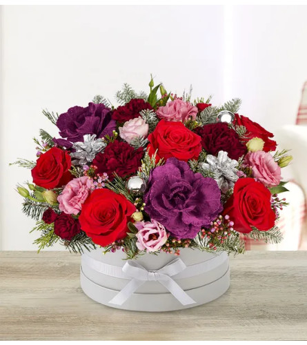 A Winter Frost Bouquet - Deluxe. An arrangement by Flowers of Jacksonville.