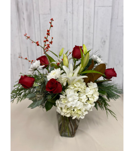 Santa's Nice List (AV). An arrangement by Avenida Flowers.