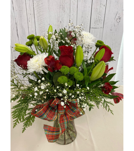 Holly Jolly Holiday (FP). An arrangement by Incredible Florist Seton.