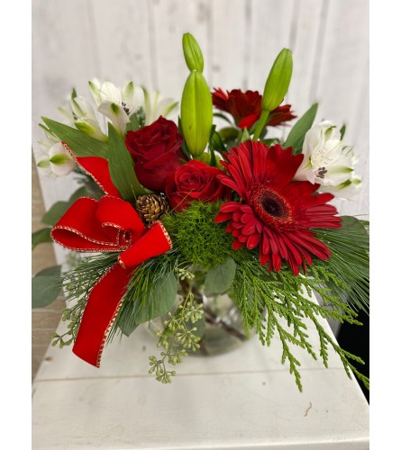 Holiday Magic (C). An arrangement by Incredible Florist.