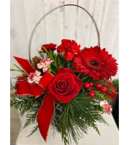 Sleigh Ride (C). An arrangement by Incredible Florist.