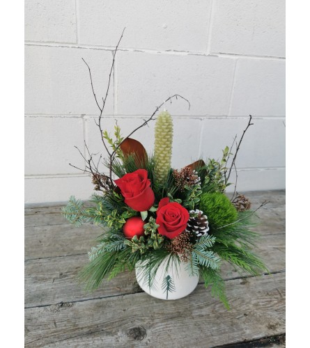 Traditional Wonderland. An arrangement by The Garden Gate Gifts and Florals.