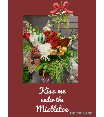 Kiss me under the mistletoe. An arrangement by DMP Flowers and Gifts.