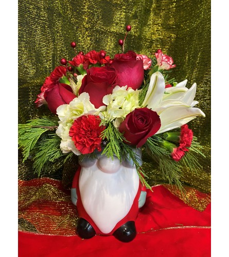 I'll Be Gnome for Christmas. An arrangement by Betty's Flower Shop.