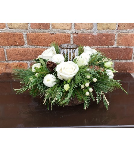 Natural and Festive with Votive. An arrangement by Flowers By Design.