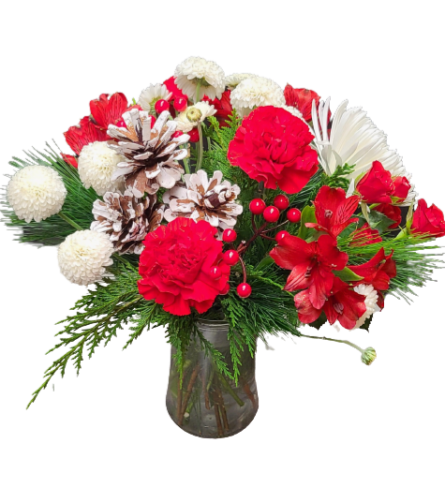 Red and White Christmas Delight. An arrangement by Harriet's Flower and Gift Shop.