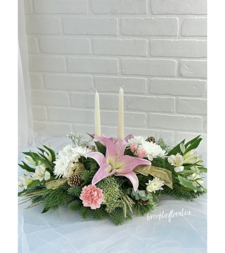 Pink and White Centrepiece with Candles. An arrangement by Brooklin Floral and Garden Shoppe Inc..