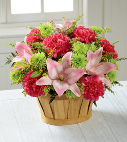 The FTD Soft Persuasion - Deluxe. An arrangement by Balloon Bouquets Plus.