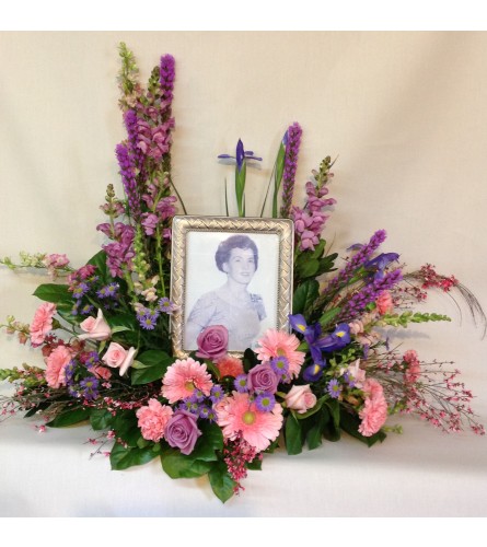 Memorial tribute photo / urn. An arrangement by Gardenfairy Florist.