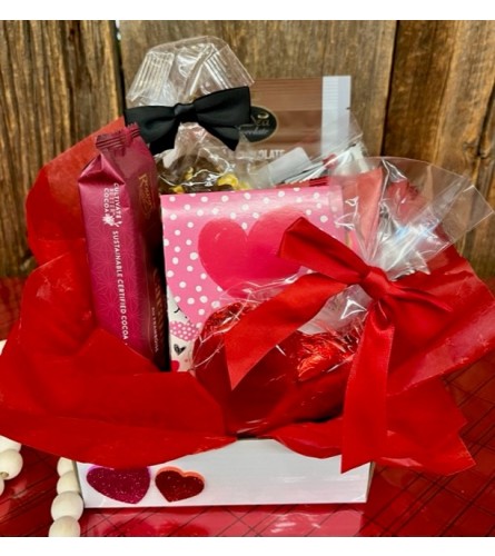SMALL VALENTINE'S TREAT BOX. An arrangement by Forest Florist.