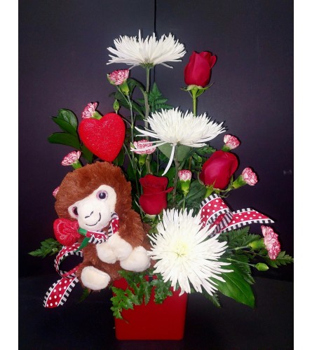 hugz and kisses. An arrangement by Grower Direct Acadia.