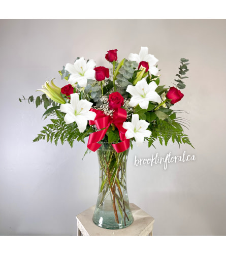 Love is Grand (Roses and Lilies). An arrangement by Brooklin Floral and Garden Shoppe Inc..