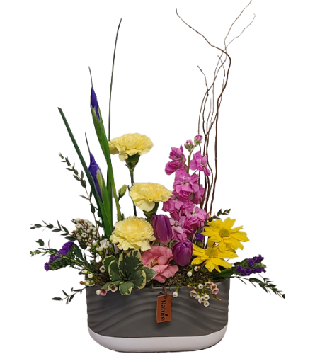 A Sunny Spring Day. An arrangement by Harriet's Flower and Gift Shop.
