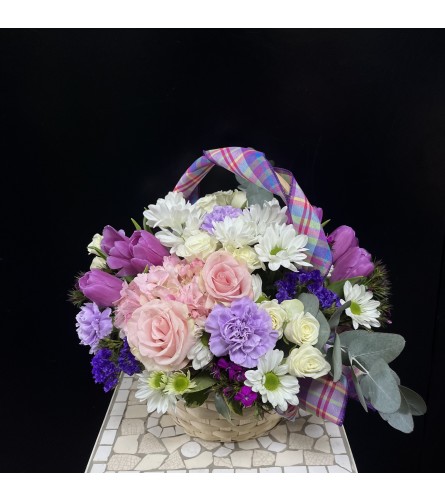 Lavender Glow. An arrangement by Marivel's Florist and Gifts.