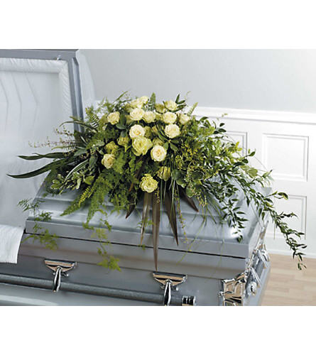 White Roses Casket Spray. An arrangement by Fletcher Heights Florist.