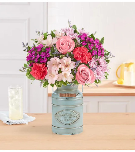 She's the Best 2023 - Deluxe. An arrangement by Flowers of Jacksonville.